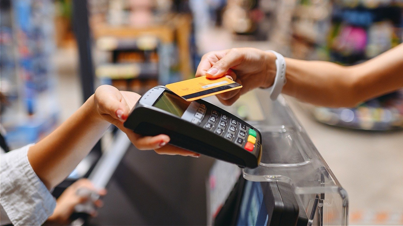 Consumers using credit cards as part of the modern financial system